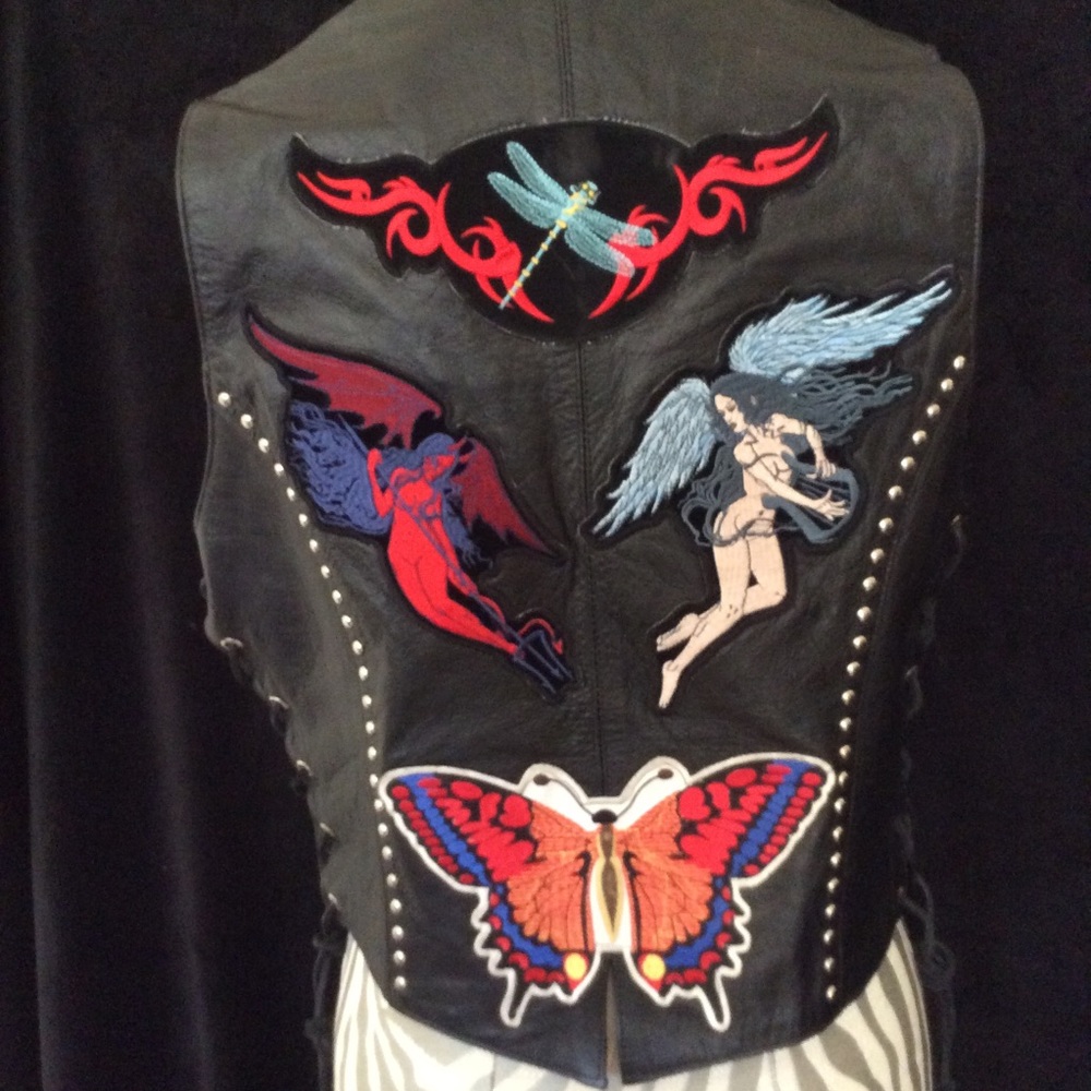 Studded leather riding vest with patches